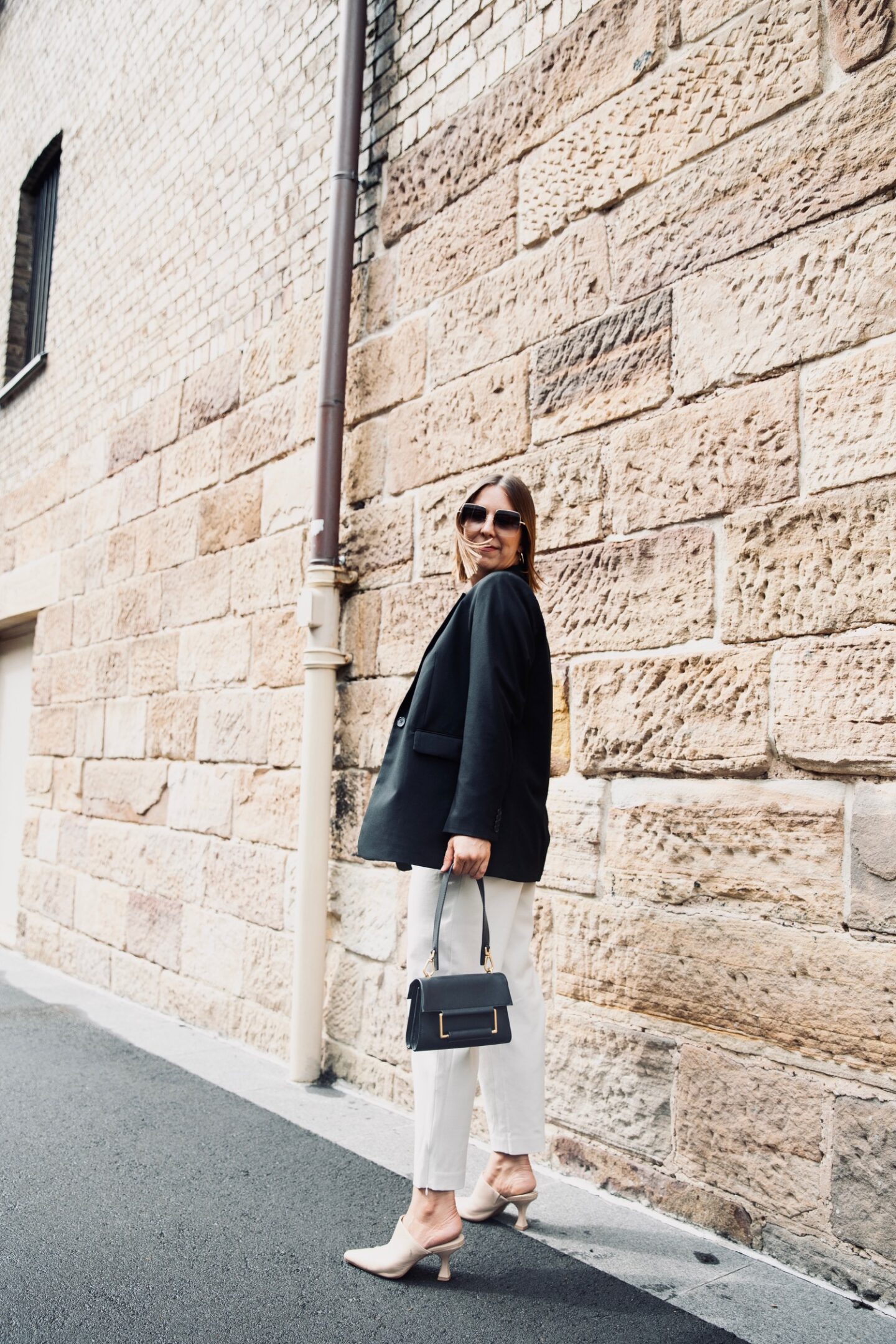 Brunette girl dressed up 30s in The Rocks Sydney